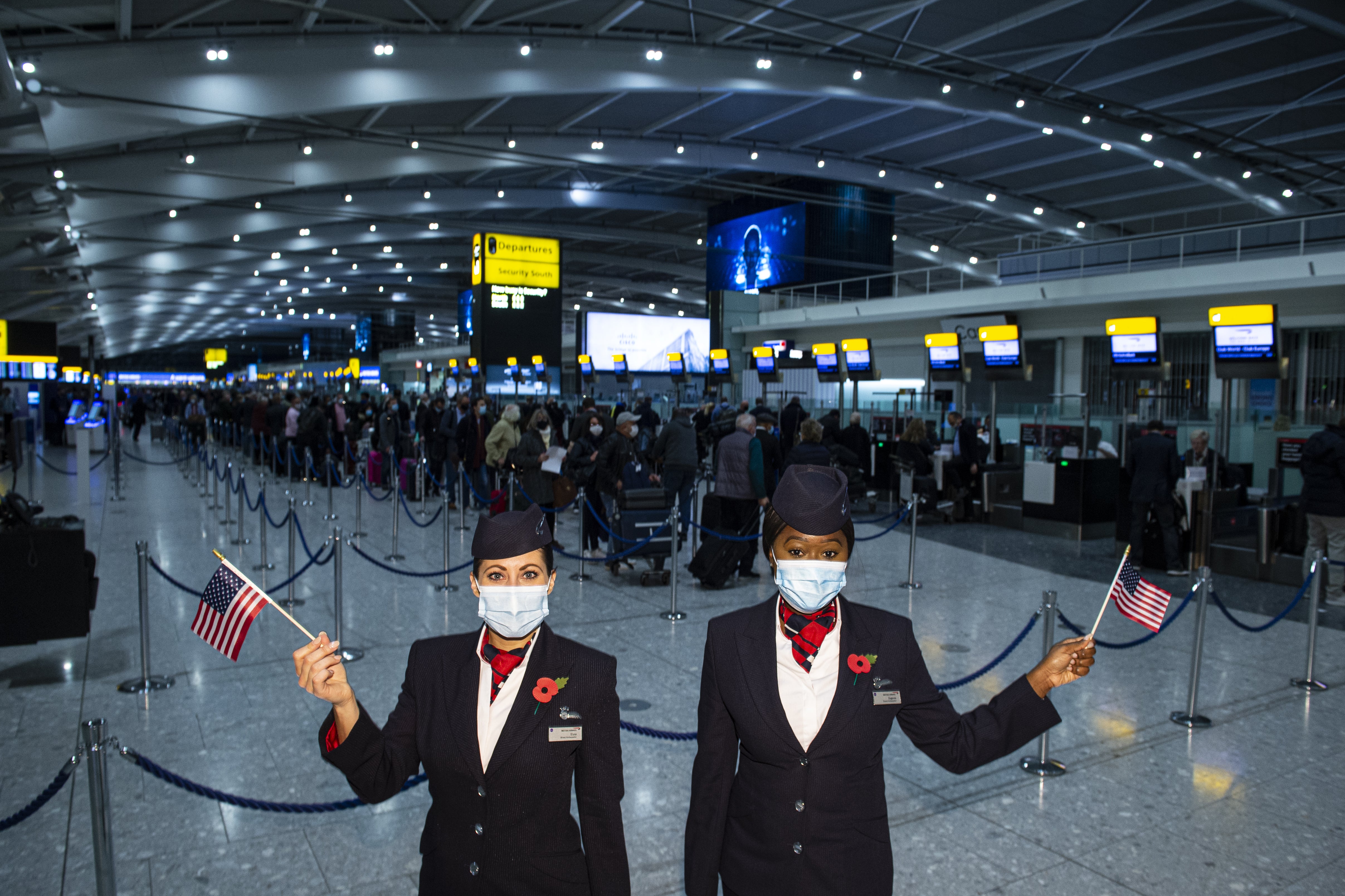 British Airways ambassadors Elysa Marsden, left, and Eugenia Okwaning at Heathrow Airport’s T5 (Anthony Upton/PA)