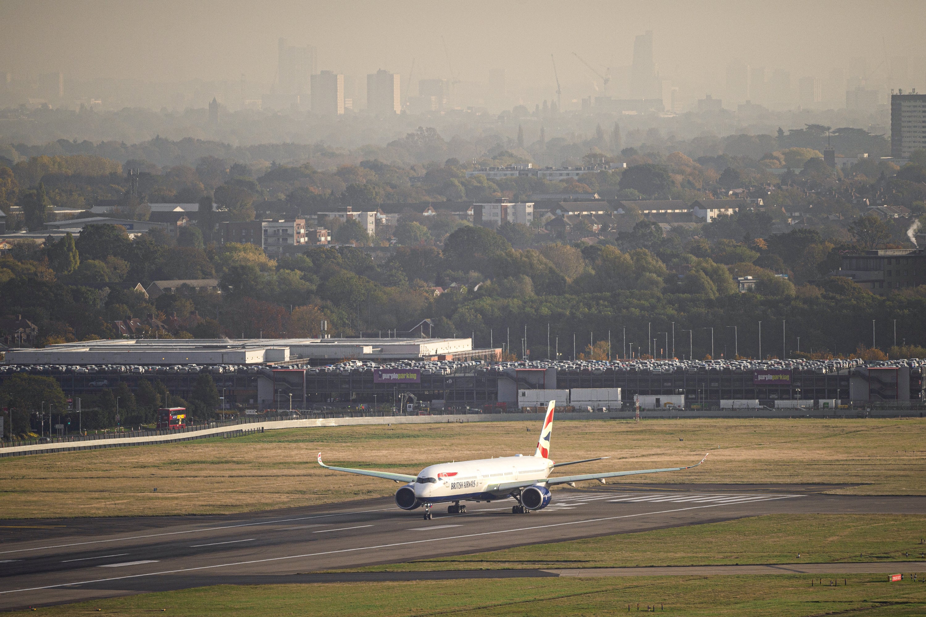 British Airways flight BA001 prepares to perform a synchronised departure with Virgin Atlantic flight VS3 on parallel runways at Heathrow Airport, heading for New York JFK (Doug Peters/PA)