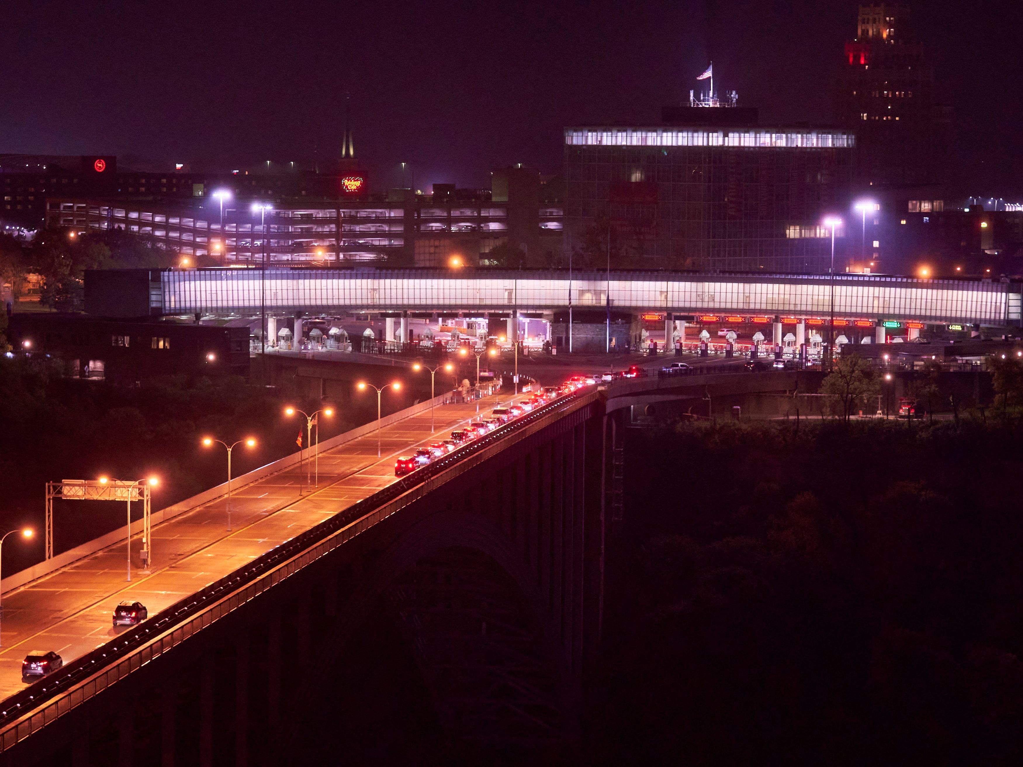 A line of cars waiting to enter the US from Canada on the Niagara Falls.