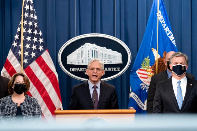 <p>Attorney General Merrick Garland, centre, accompanied by Deputy Attorney General Lisa Monaco, left, and FBI Director Christopher Wray, right, speaks at a news conference at the Justice Department in Washington, Monday, Nov. 8, 2021. (AP Photo/Andrew Harnik)</p>