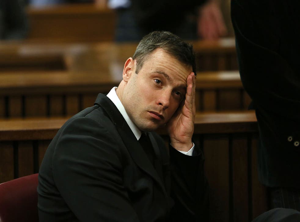 <p>Pistorius gestures at the end of the fourth day of his trial for murdering his girlfriend</p>