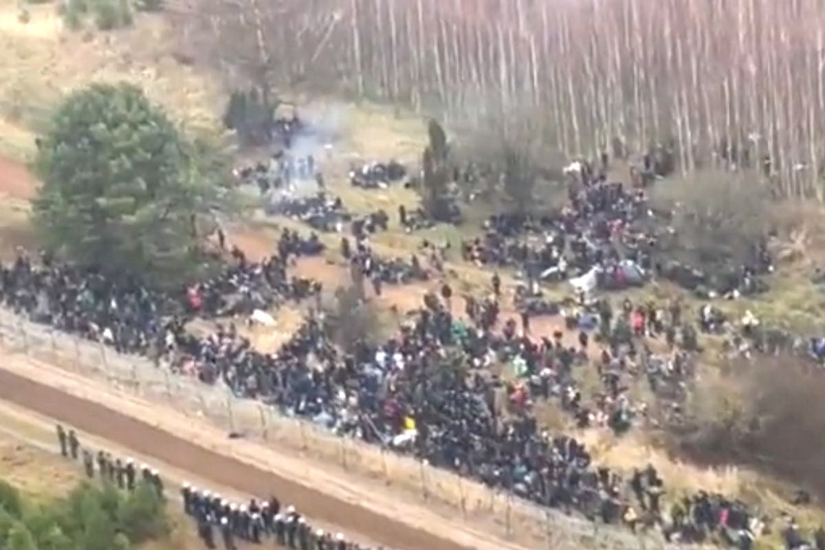Thousands of migrants aided by Belarus attempt to storm Polish border