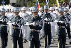 Taiwan says China seeking to degrade its military and morale