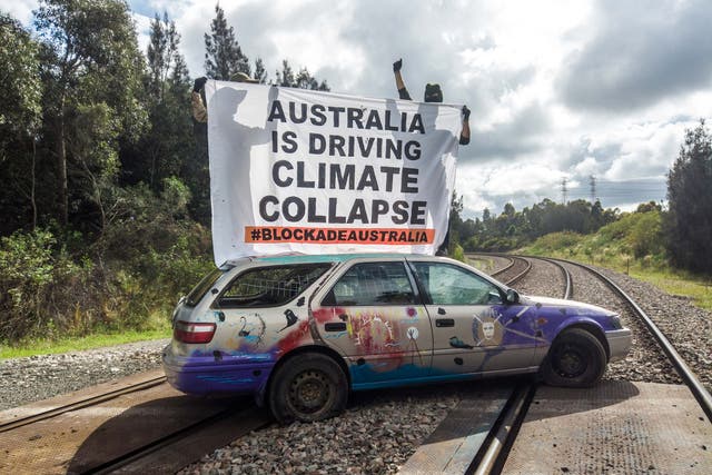 <p>The car is blocking a railway line heading into the world’s largest coal port</p>