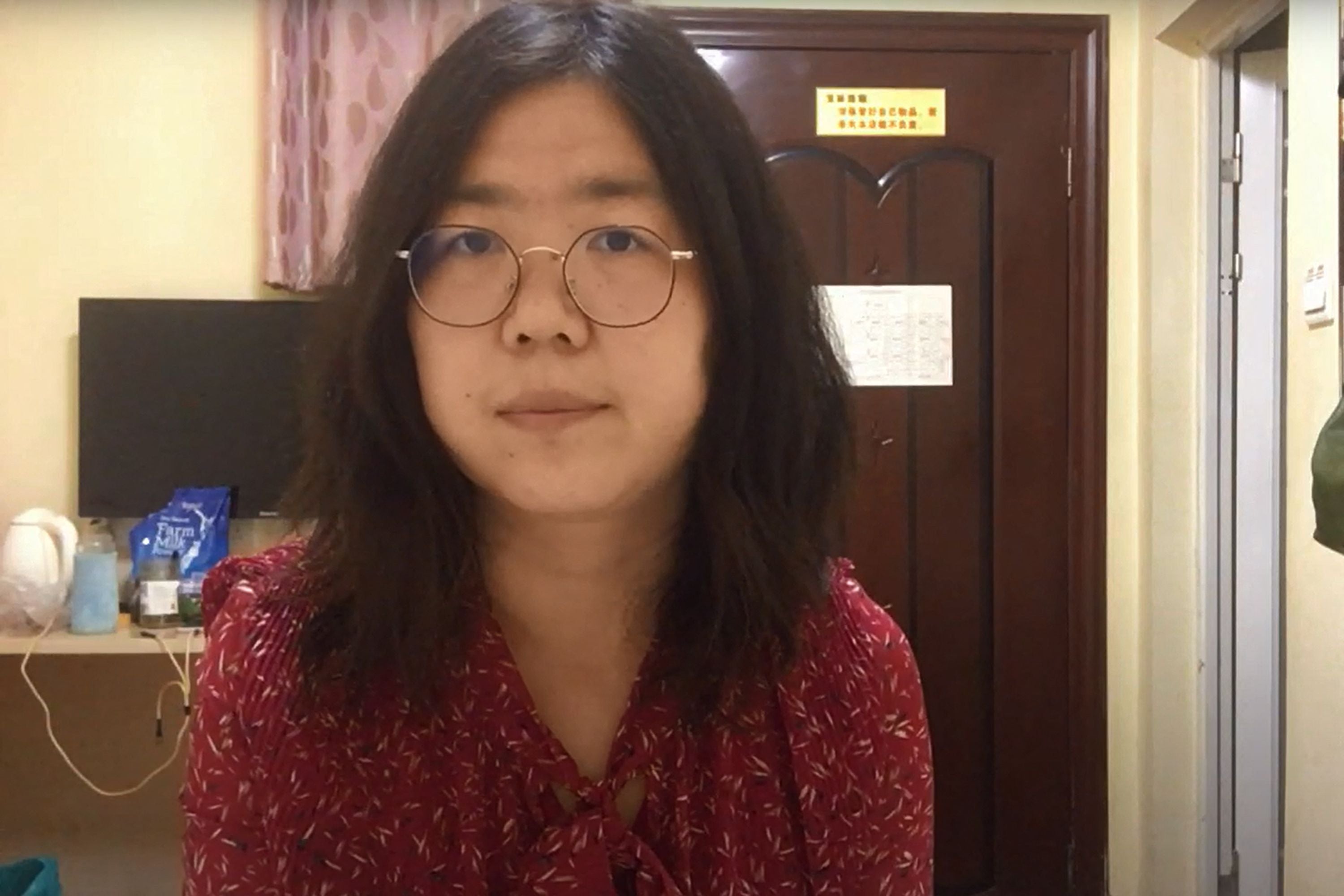 Former Chinese lawyer and citizen journalist Zhang Zhan broadcasts via YouTube on December 28, 2020