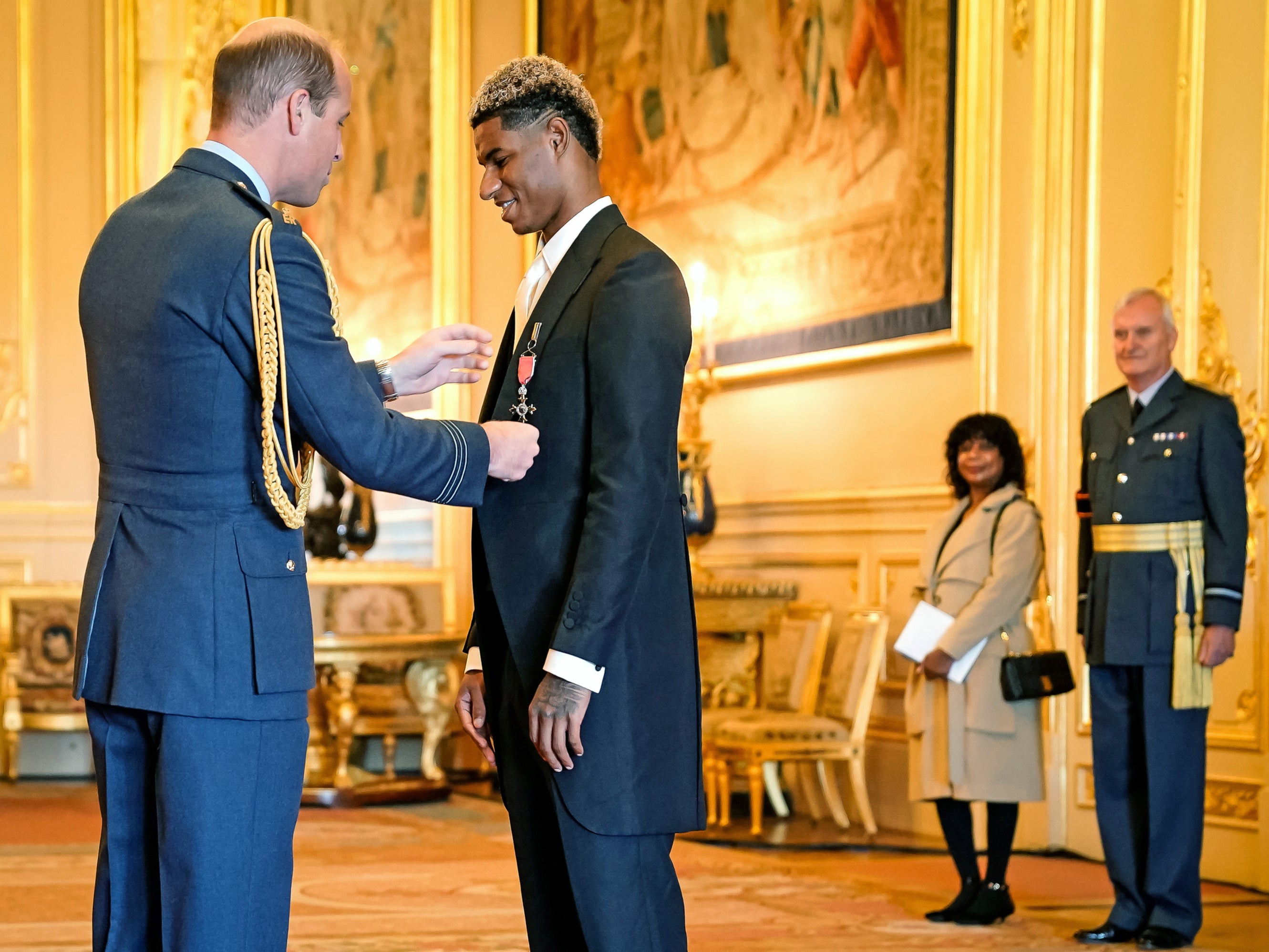 Marcus Rashford is awarded his MBE by Prince William at Windsor Castle
