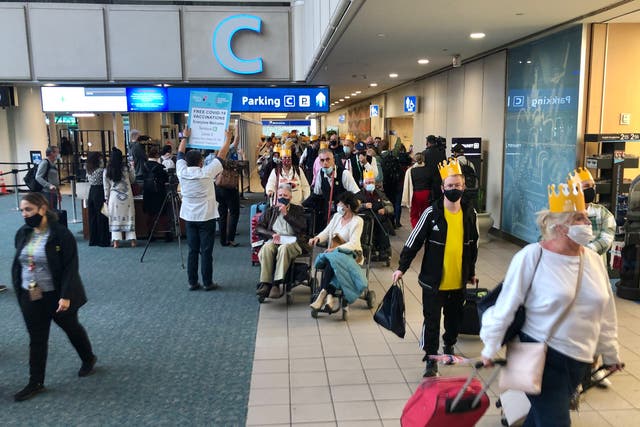 <p>Back in the USA: Passengers at Orlando airport in Florida arriving on the first flight from the UK – Virgin Atlantic from Manchester</p>