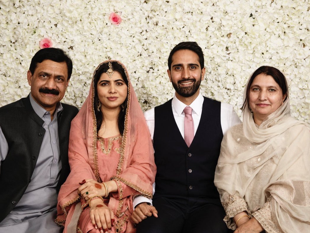 Malala with her new husband, Asser, and her parents