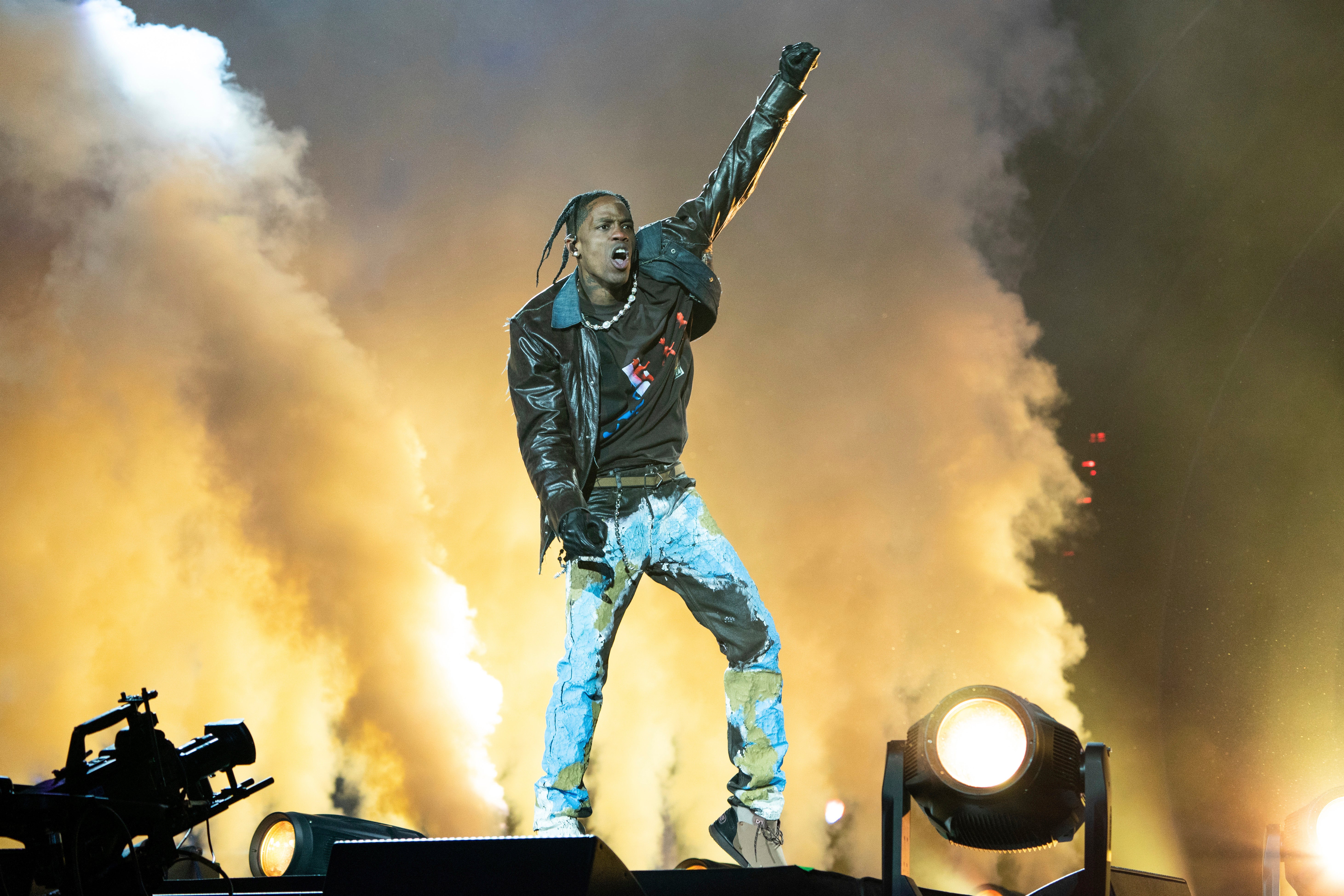 Travis Scott says that pyrotechnics and other paraphernalia onstage prevented him from being able to see what was unfolding