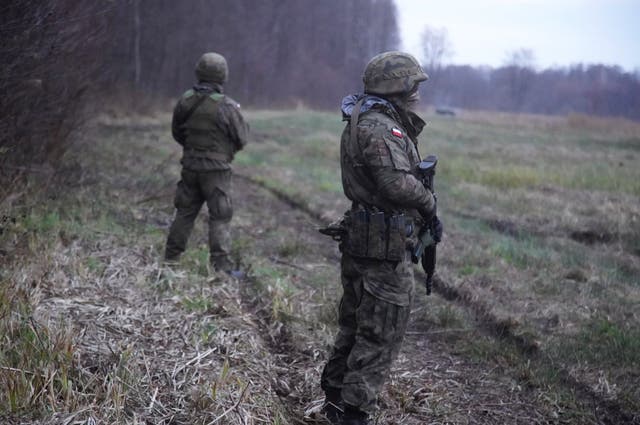 <p>Polish soldiers patrol the Poland/Belarus border</p>