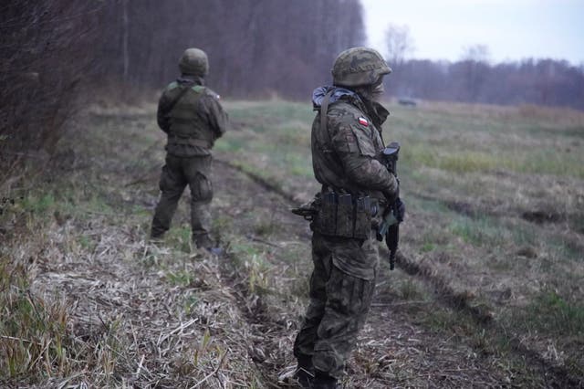 <p>Polish soldiers patrol the Poland/Belarus border</p>