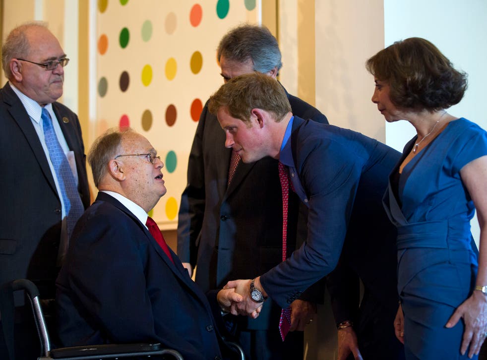 <p>Meeting Prince Harry at a dinner at the British ambassador’s Washington residence in 2013</p>