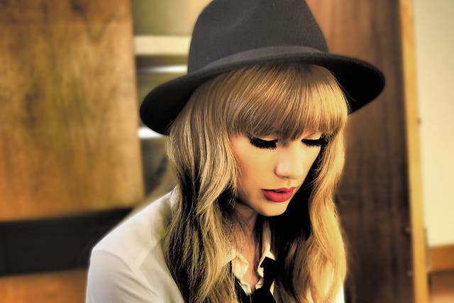 <p>Taylor Swift in promotional artwork for her re-recorded version of ‘Red'</p>