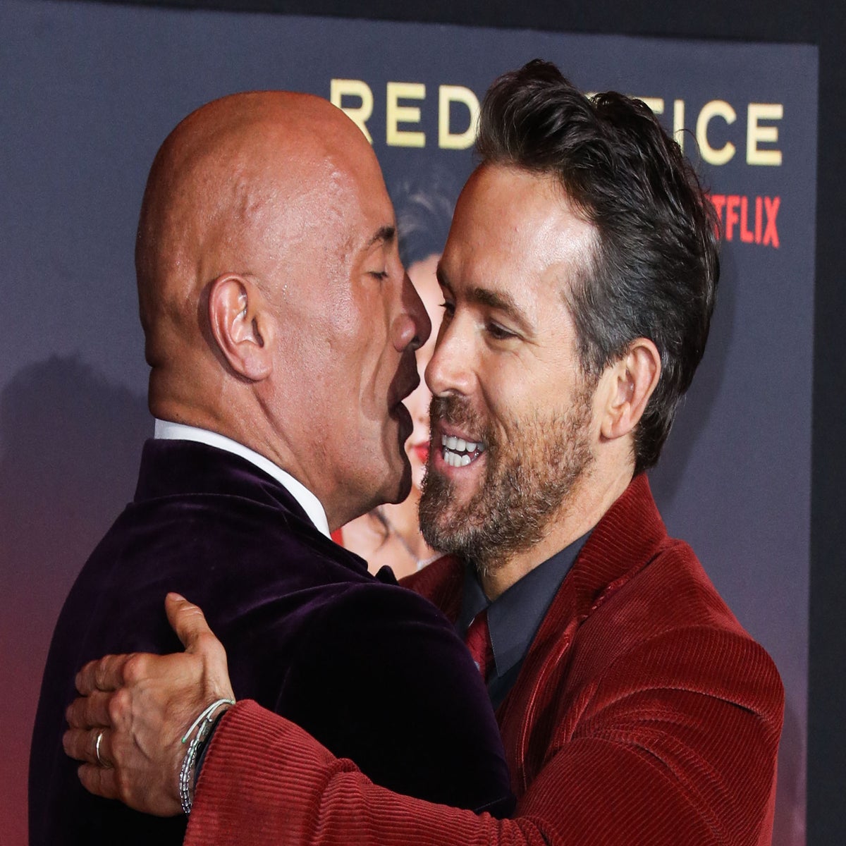 Dwayne Johnson trolls Red Notice co-star Ryan Reynolds with massive  billboard