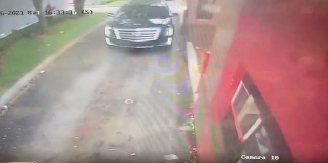 <p>Video shows the car being ambushed by three gunmen in North Miami Beach on Saturday</p>