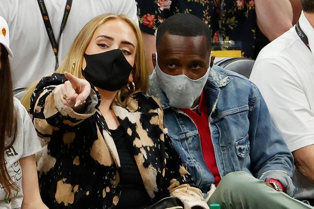 <p>Adele with her boyfriend, Rich Paul, at an NBA game in July</p>