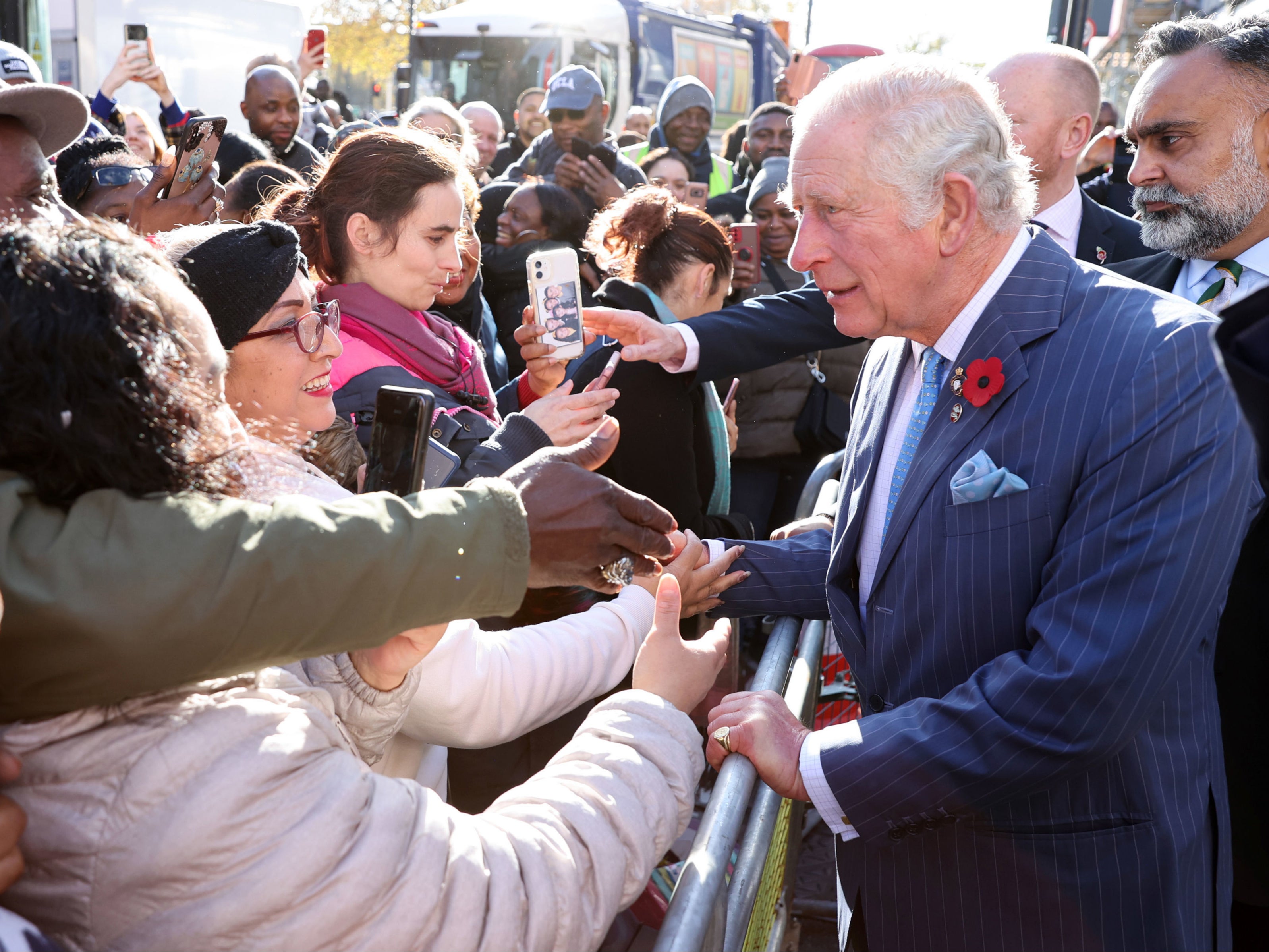 The Prince of Wales (right) meets members of the public as he departs a visit to meet Prince's Trust Young Entrepreneurs, supported through the Enterprise programme at NatWest, in London
