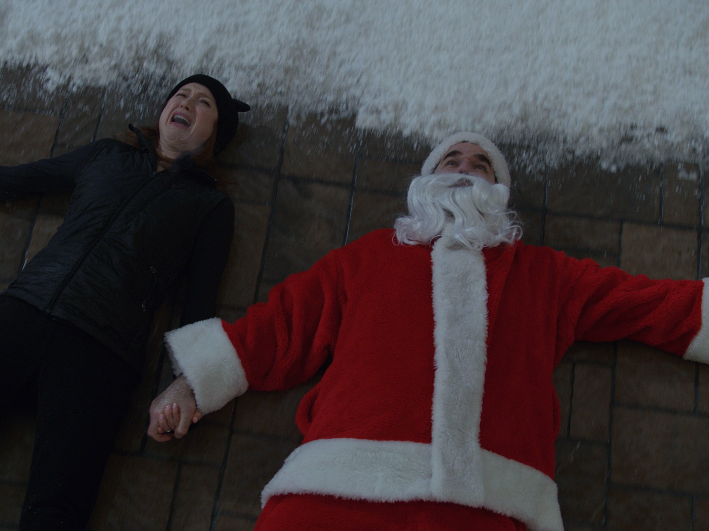 Pam Fritzovski (Ellie Kemper) and Jeff Fritzovski (Rob Delaney) break in to steal a doll that’s worth a fortune