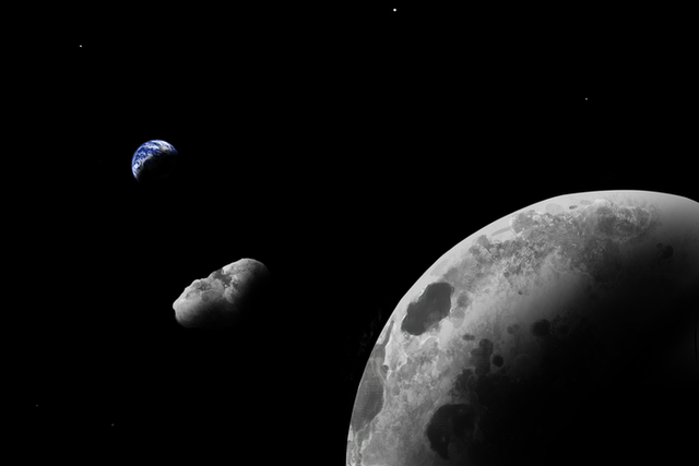 Una impresión artística del cuasi-satélite de la Tierra Kamo`oalewa cerca del sistema Tierra-Luna. Los astrónomos que utilizan el gran telescopio binocular han demostrado que podría ser un fragmento perdido de la Luna.