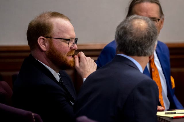 <p>Travis McMichael during a recess in his murder trial on 9 November </p>