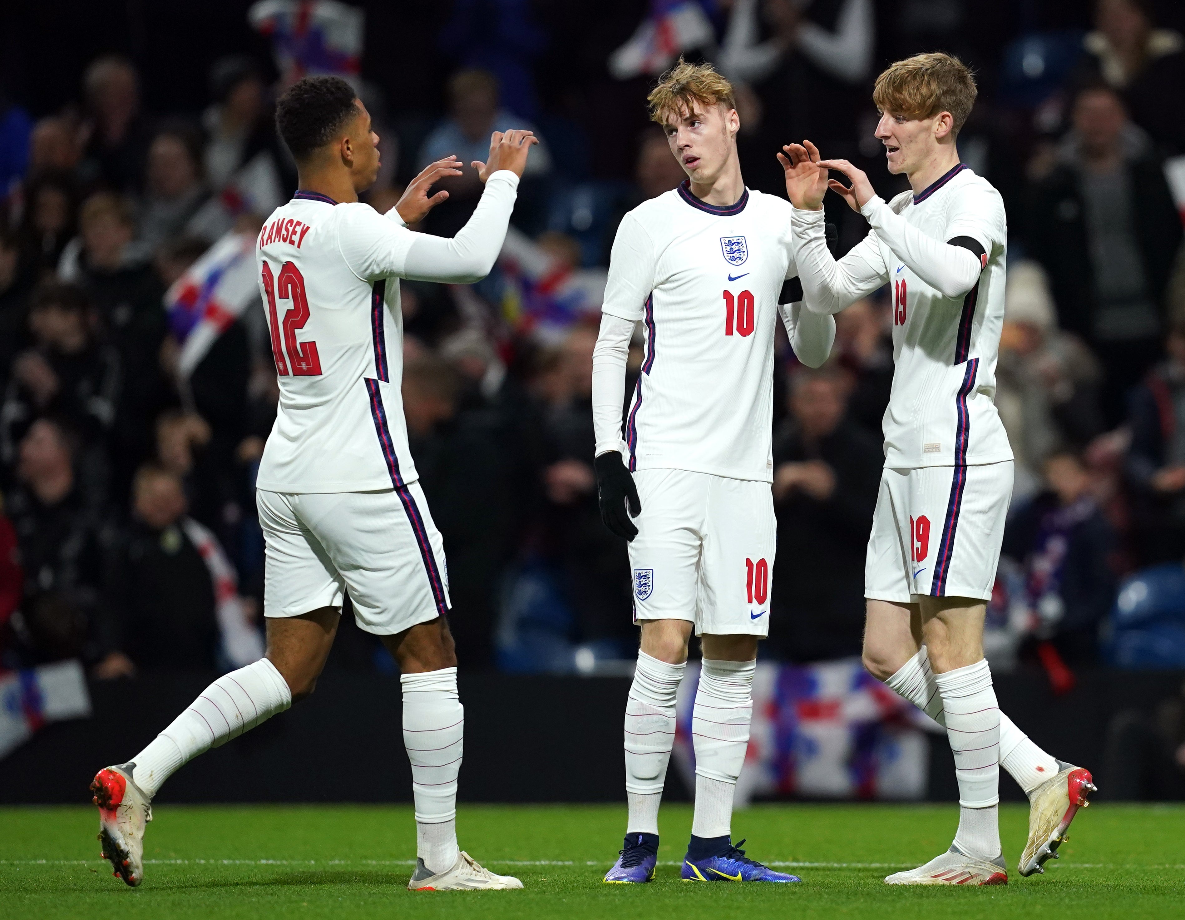 England Under-21s celebrate Anthony Gordon’s opener (Martin Rickett/PA)