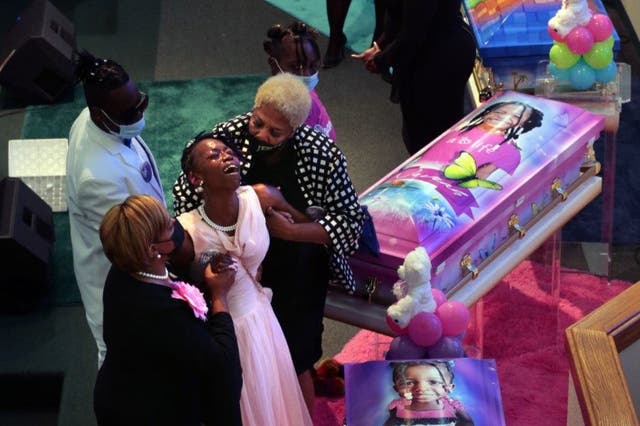 <p>Sabrina Dunigan had to be helped through the 21 August funeral for her five children. She now faces charges in connection with the deaths of Heaven and Neveah Dunigan, 8; Deontae Davis Jr, 9; Jabari Johnson, 4; and Loy-el Dunigan, 2</p>