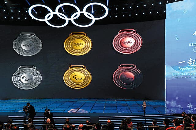 <p>Gold, silver and bronze medals for the Beijing 2022 Winter Olympics (top row) and Paralympics are unveiled on Oct 26 in Beijing</p>