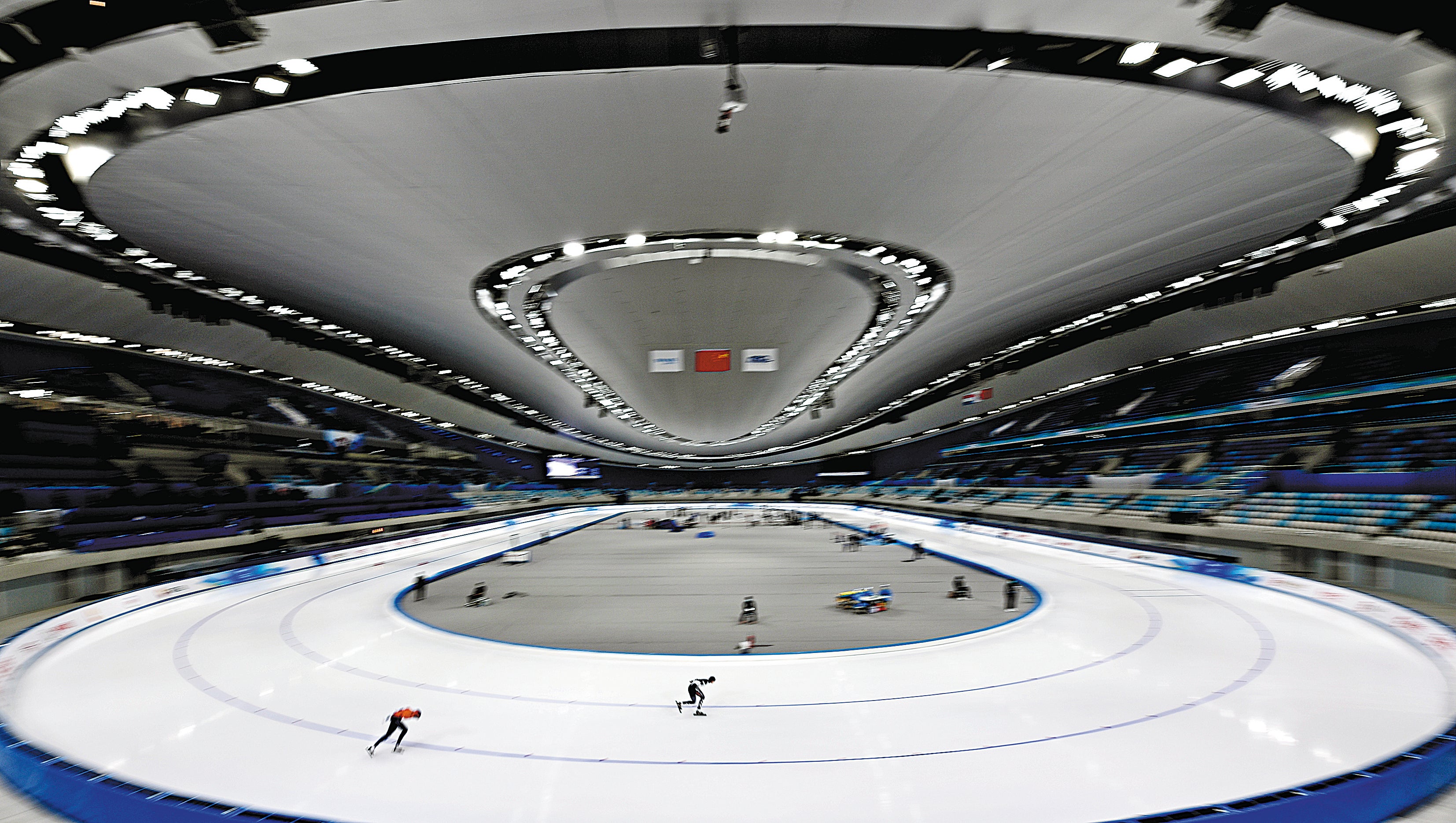 Athletes compete in an international test event for next year’s Beijing Winter Olympics at the newly opened National Skating Oval in October