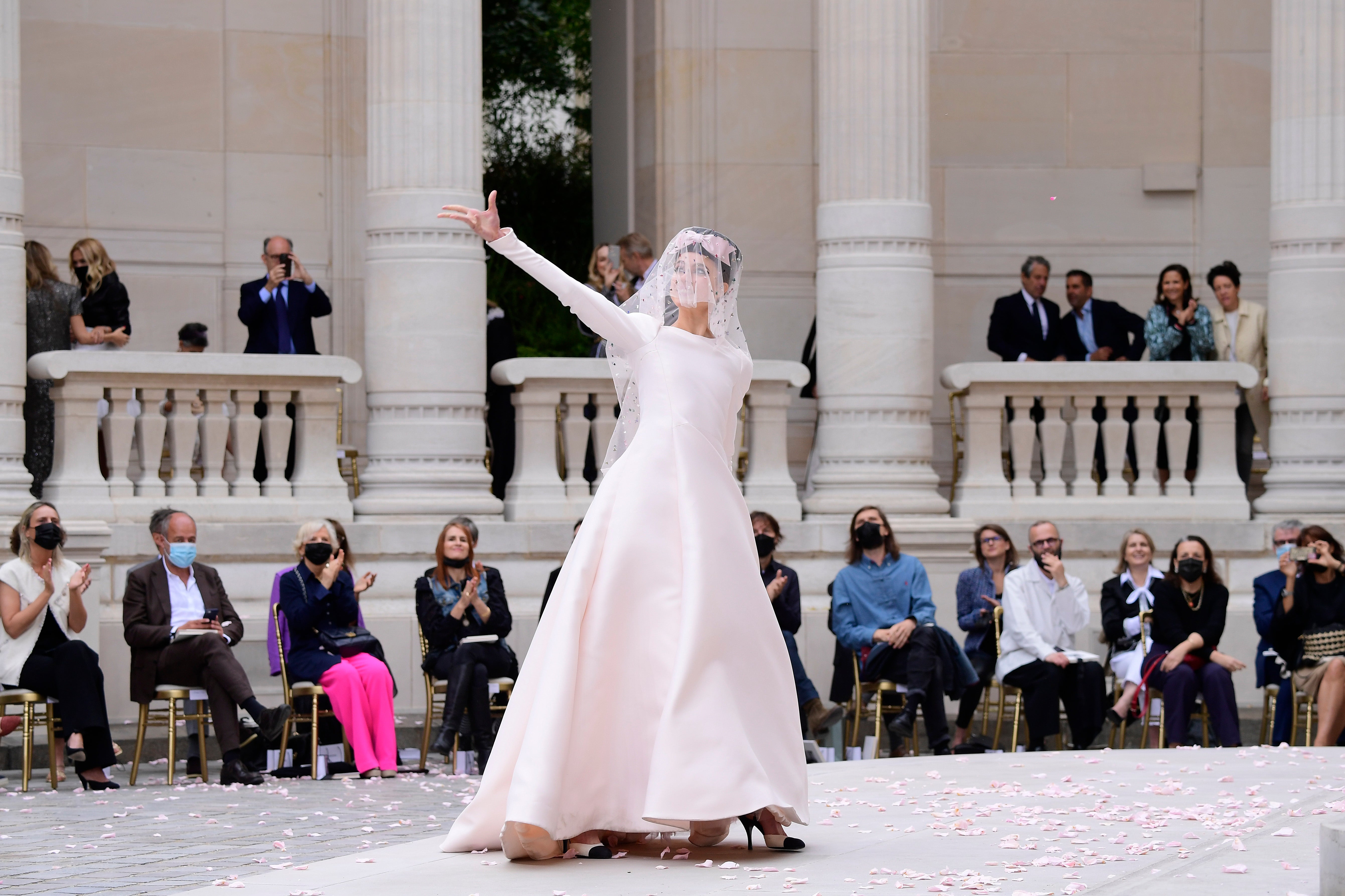 Qualley glides out for the finale at the Palais Galliera, Paris