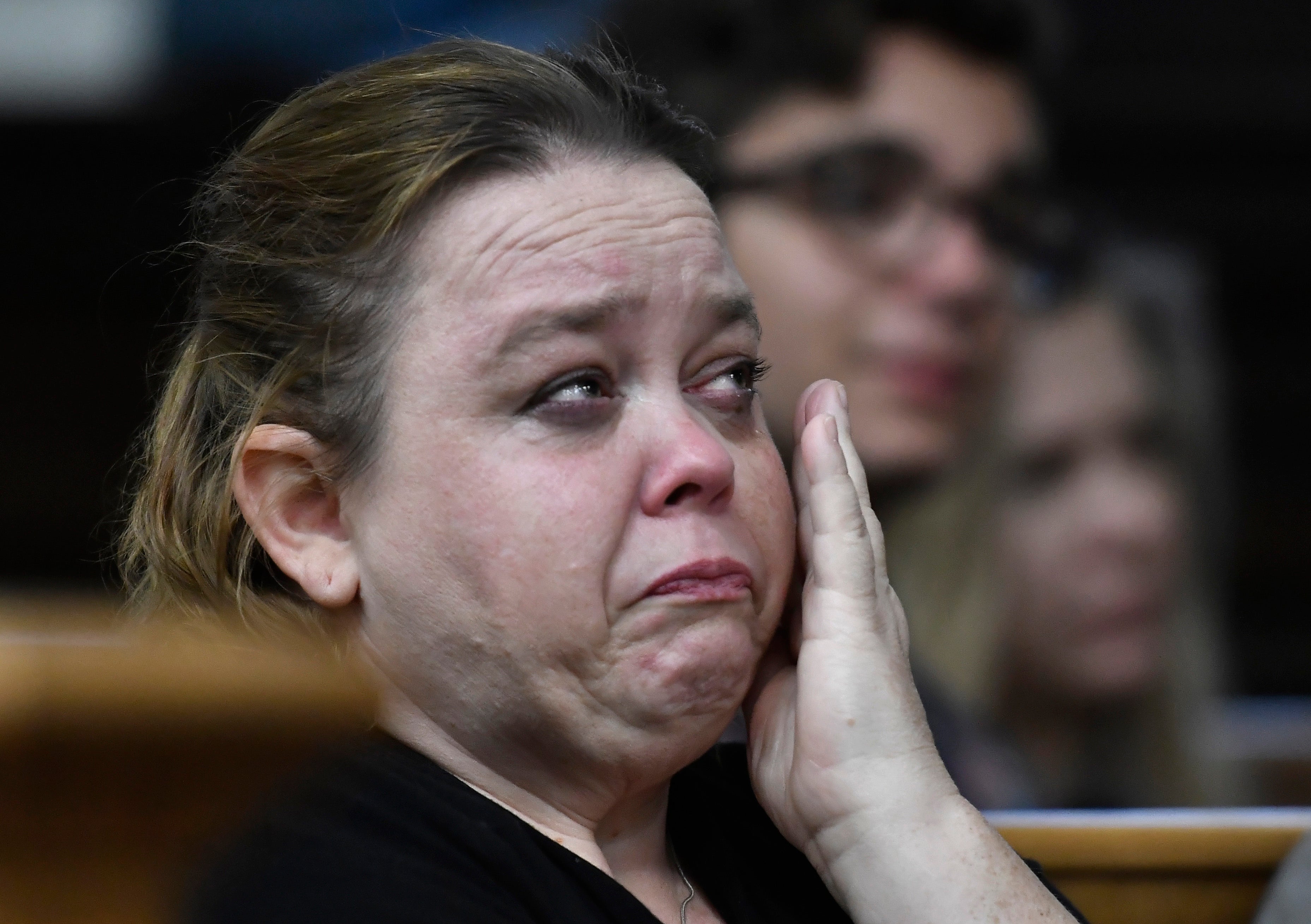 Wendy Rittenhouse wipes away tears in court on 10 November 2021