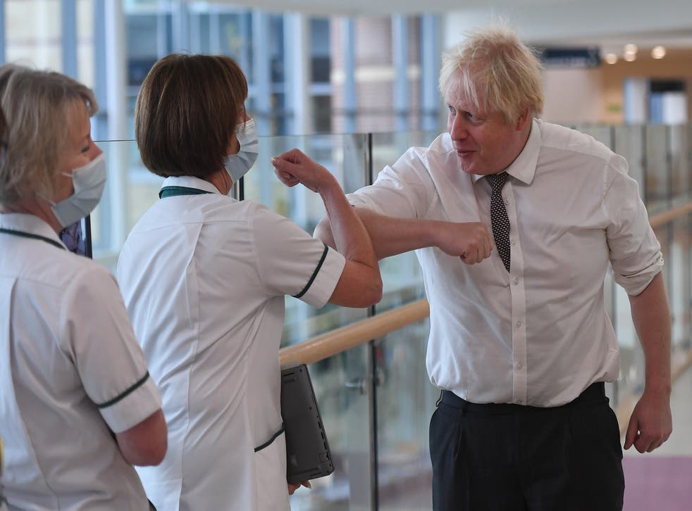 <p>Prime minister Boris Johnson meets with medical staff during a visit to Hexham General hospital in Northumberland </p>