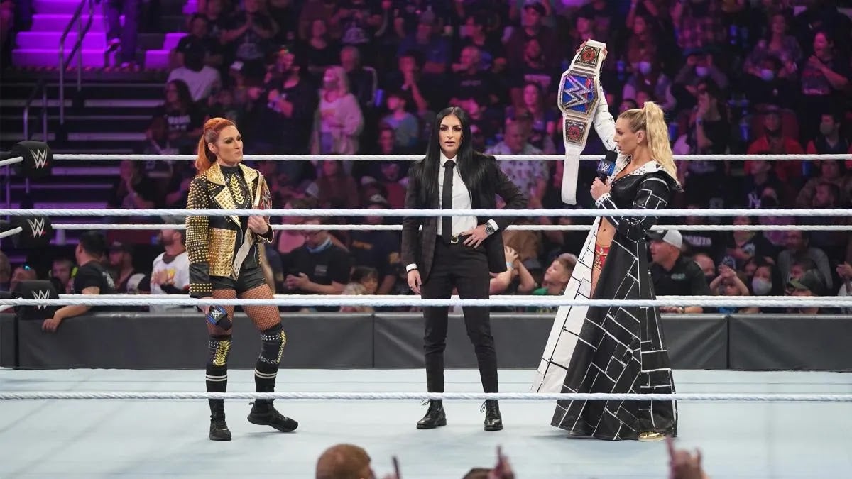 Becky Lynch and Charlotte Flair ahead of their title exchange on WWE SmackDown