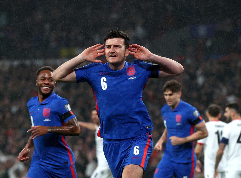 <p>Harry Maguire celebrates opening the scoring for England against Albania</p>