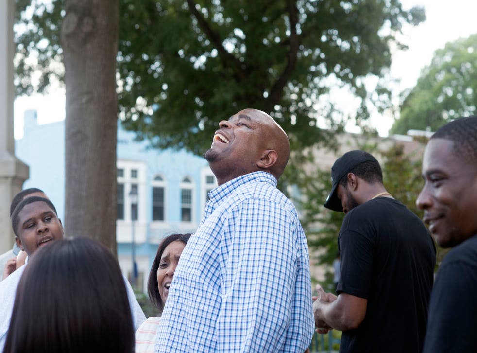 <p>Dontae Sharpe breathing the air outside the Pitt County Courthouse in November 2019 after he finally walked free after spending 24 years behind bars for a crime he didn’t commit </p>