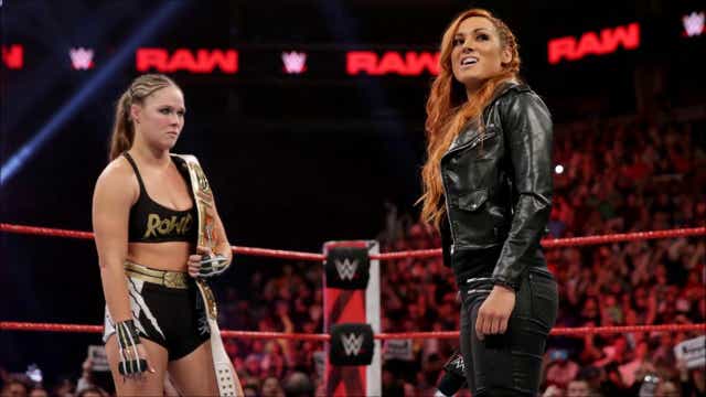 <p>Ronda Rousey and Becky Lynch in the ring ahead of WWE WrestleMania 35</p>