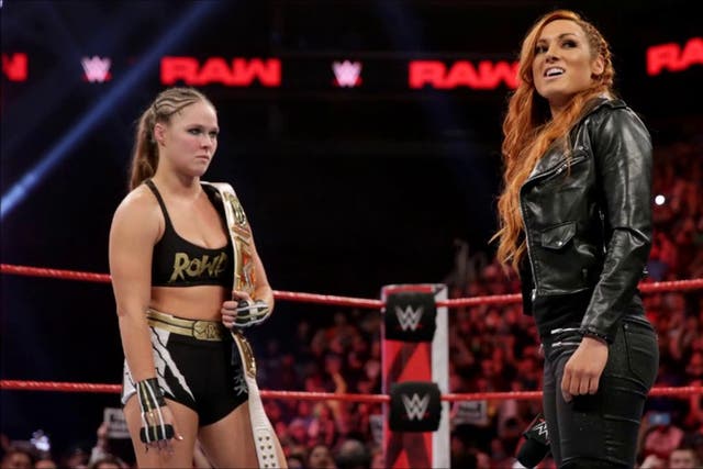 <p>Ronda Rousey and Becky Lynch in the ring ahead of WWE WrestleMania 35</p>
