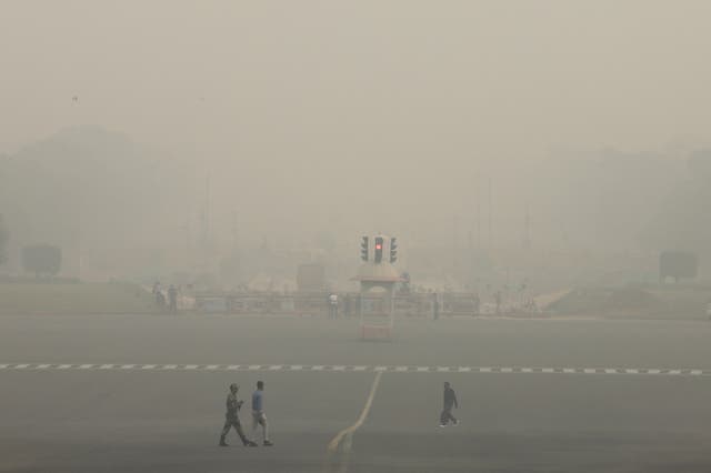 <p>A view of the Rajpath through central Delhi, seen on Friday amid a spell of thick, deadly smog in India’s capital</p>