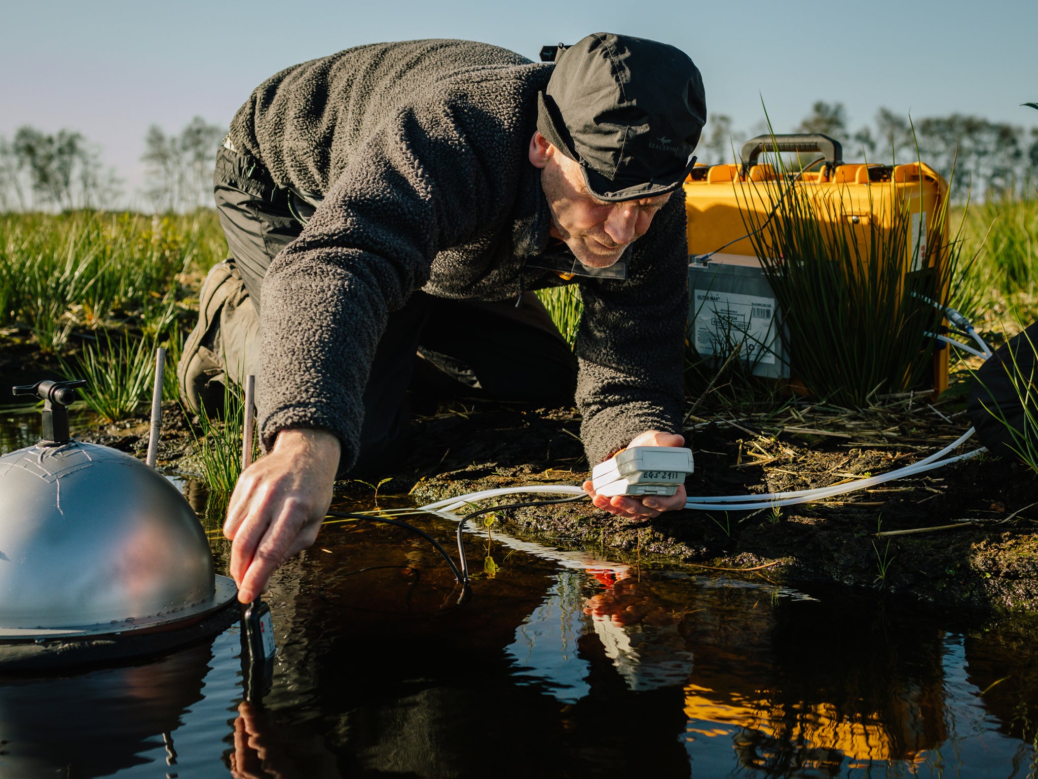 Scientist Chris Field of Manchester Metropolitan University measures water temperature and nutrient levels at Winmarleigh and Cockerham Moss, Lancashire’s largest peatland