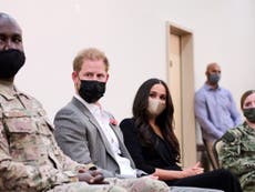 Prince Harry and Meghan Markle share Archie’s favourite song as they visit young Afghan refugees