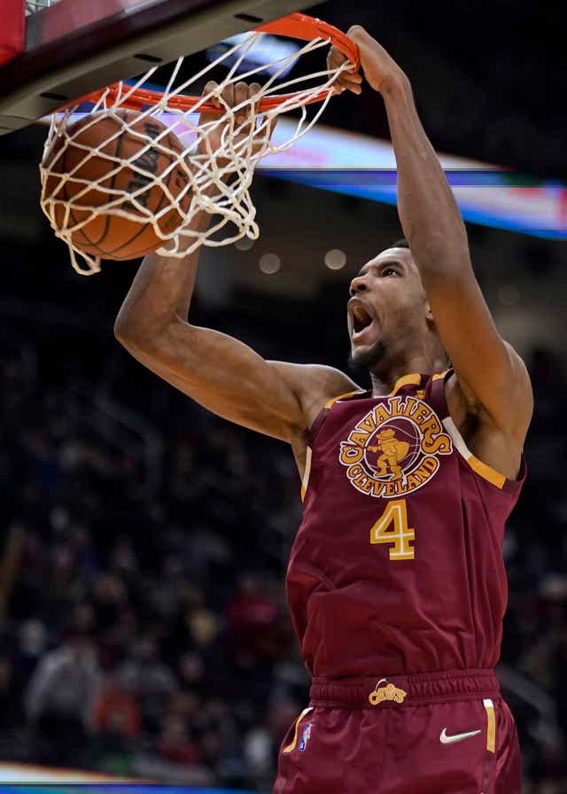 The Cleveland Cavaliers’ Evan Mobley dunks the ball against the Boston Celtics (Tony Dejak/AP)