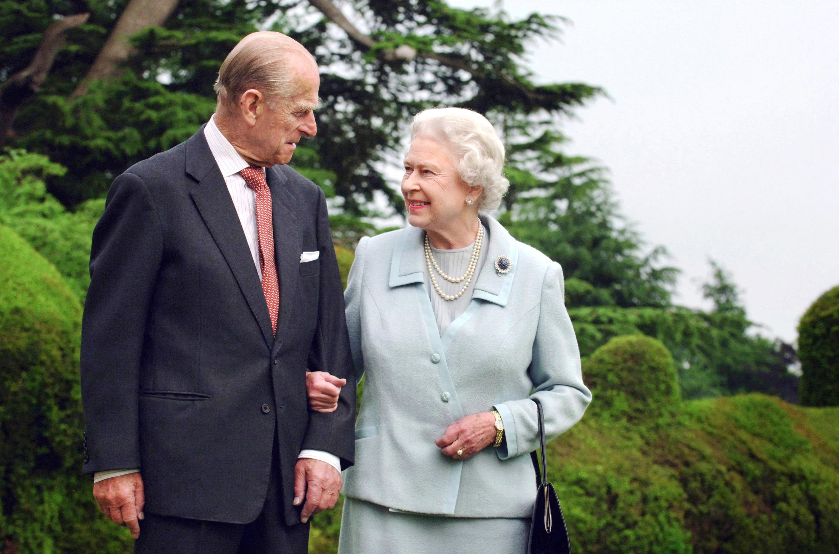 Queen Elizabeth II and her husband, the Duke of Edinburgh walking at Broadlands, Hampshire in 2007