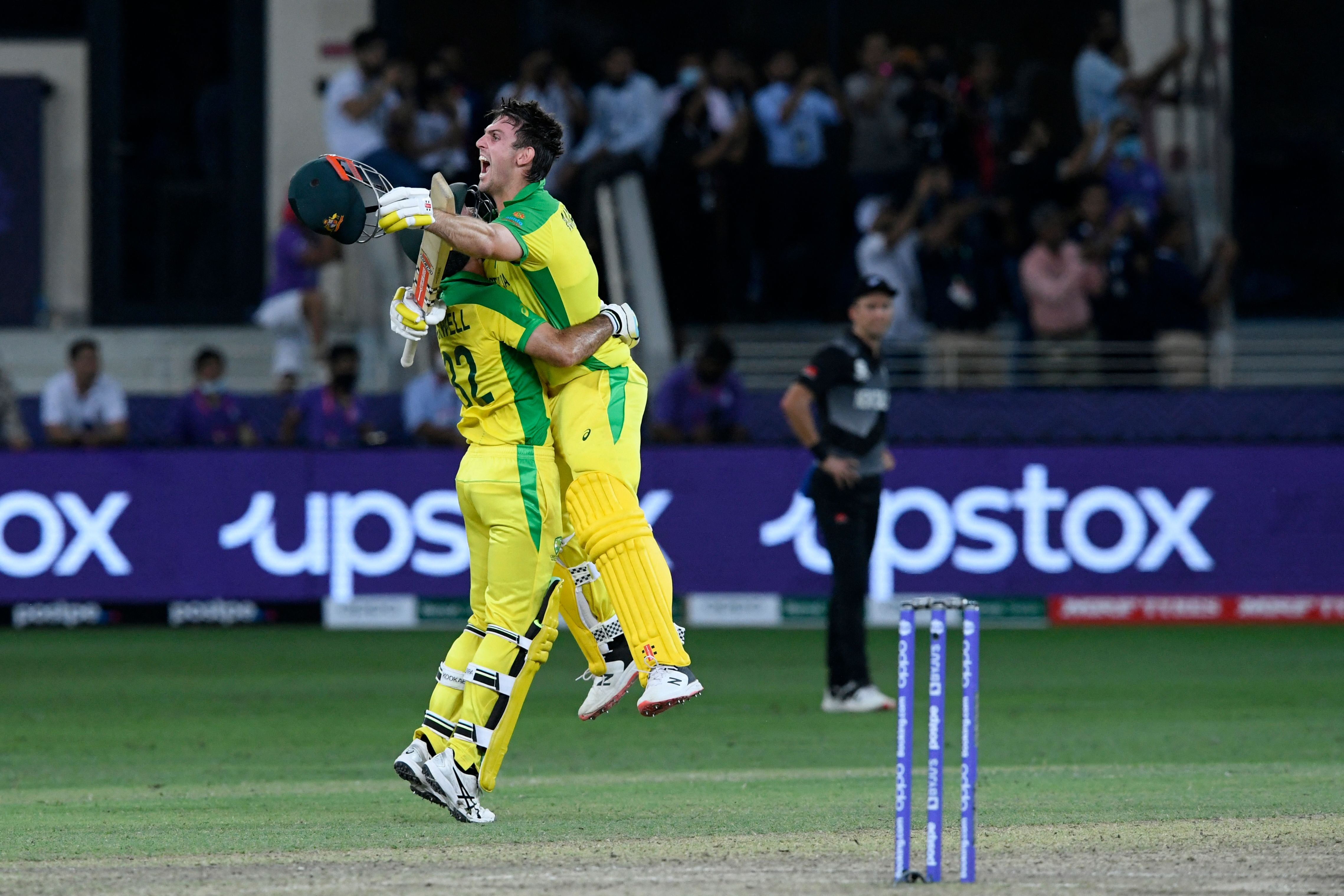 Australia's Glenn Maxwell (L) and Mitchell Marsh celebrate their win