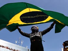 Brazilian Grand Prix: Lewis Hamilton wins after thrilling battle with Max Verstappen