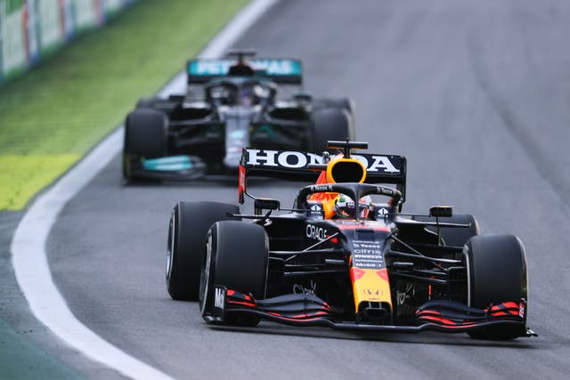 <p>Lewis Hamilton beat Max Verstappen to the chequered flag </p>