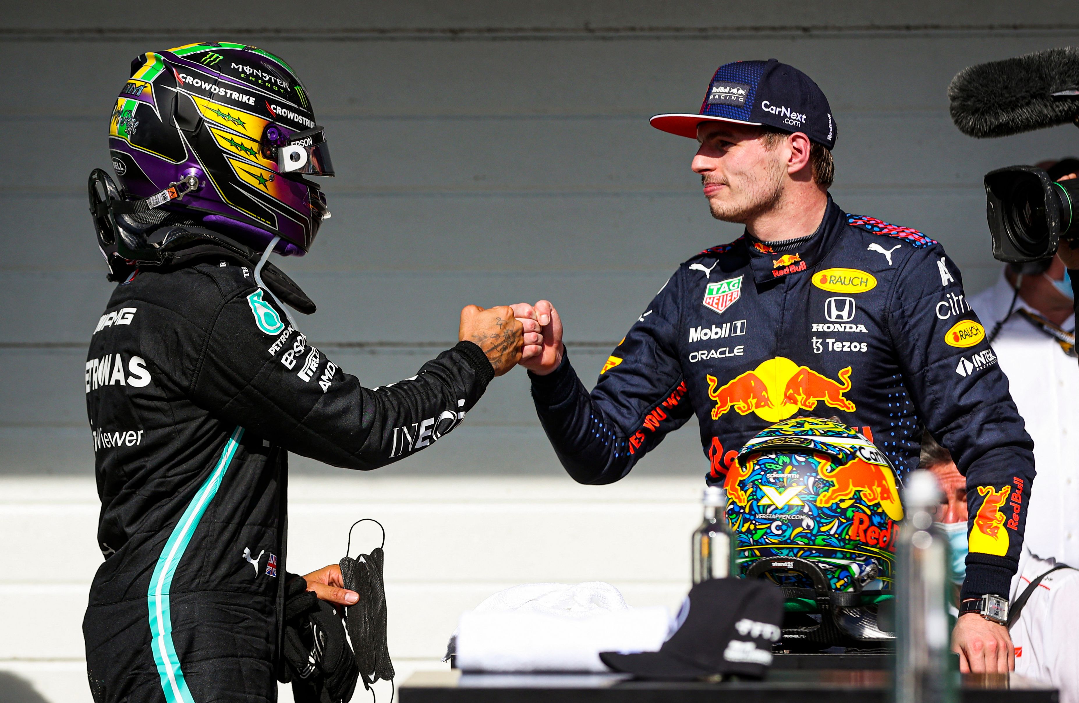 Max Verstappen, right, congratulates Lewis Hamilton