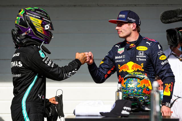 <p>Max Verstappen congratulates Lewis Hamilton after their dramatic duel at Interlagos </p>