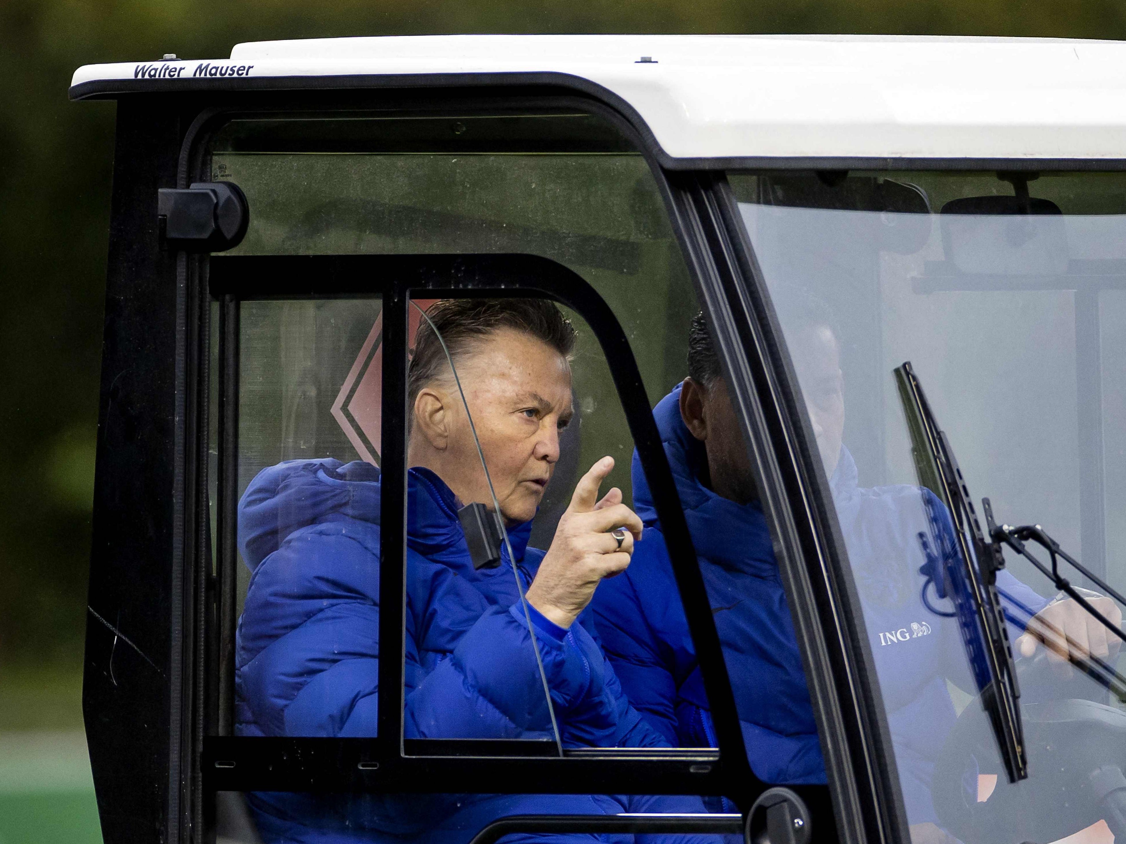Louis van Gaal takes Netherlands training from a golf cart
