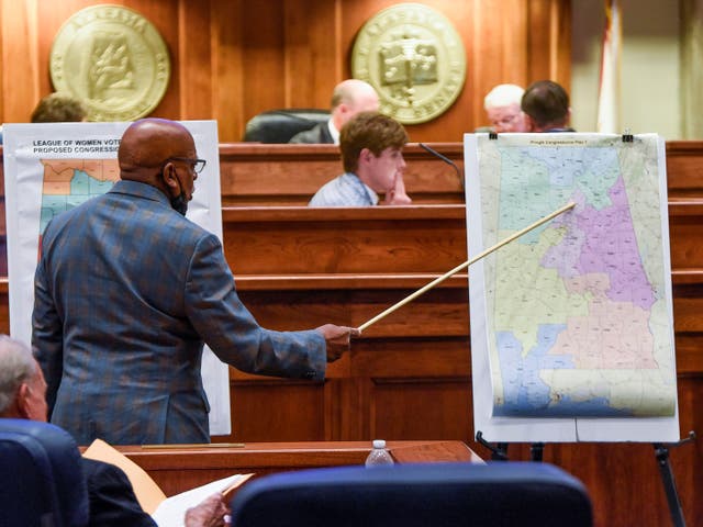 <p>Sen. Rodger Smitherman compares U.S. Representative district maps during the special session on redistricting at the Alabama Statehouse in Montgomery, Ala., on Wednesday, Nov. 3, 2021</p>