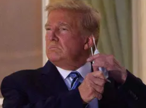 Donald Trump removes mask after returning to White House on 5 October 2020