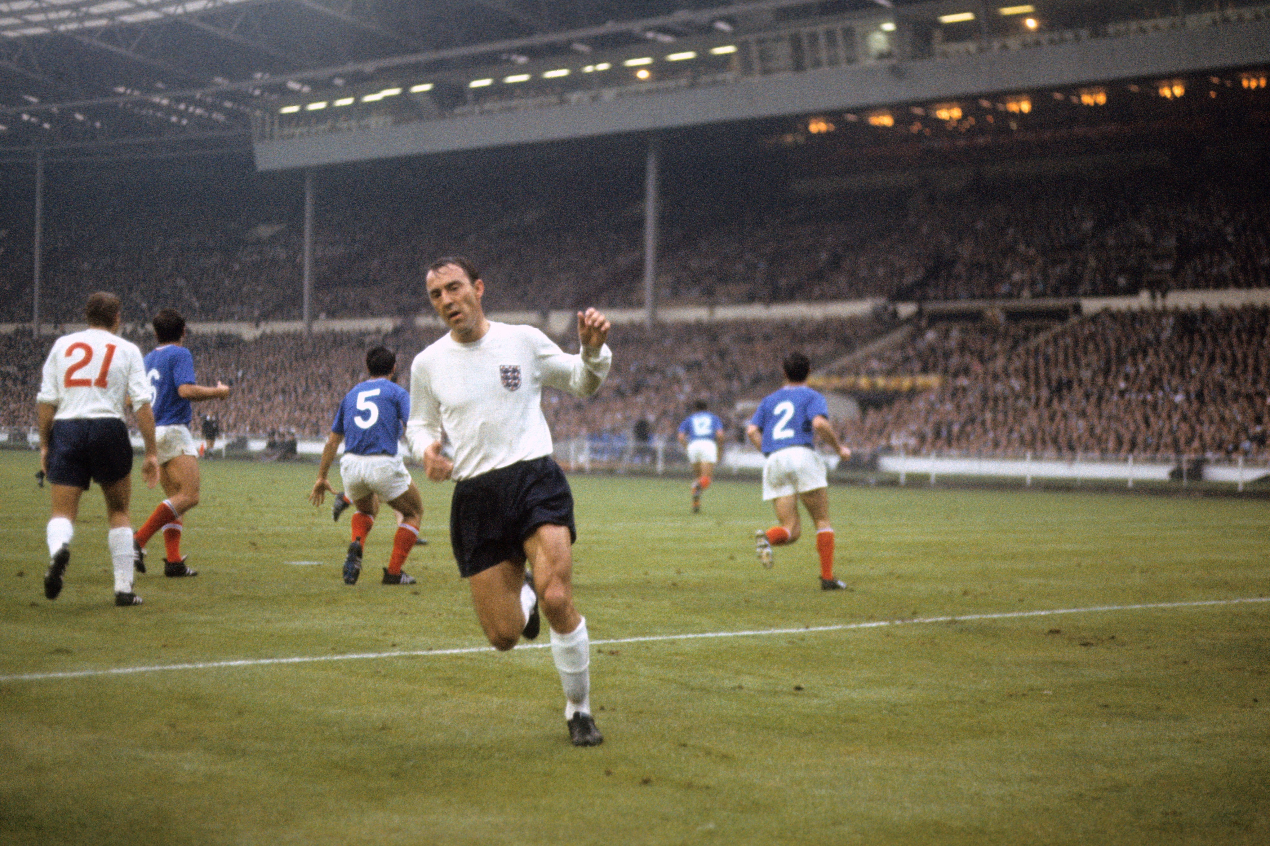 Jimmy Greaves in action for England (PA)